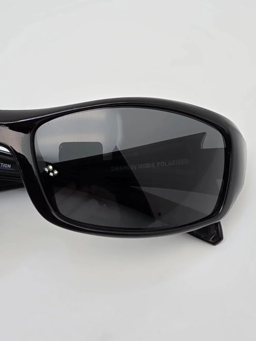Hobie Motion Collection Swami Black Frame Polarized Grey Lens Sunglasses 60mm